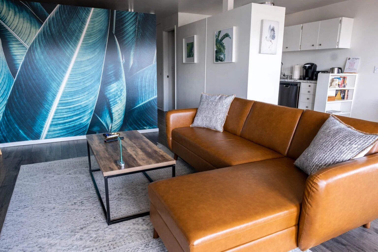 The Nest bedroom with mural accent wall